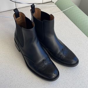 Church’s classic black boots